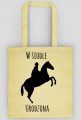 W siodle torba