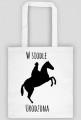 W siodle torba